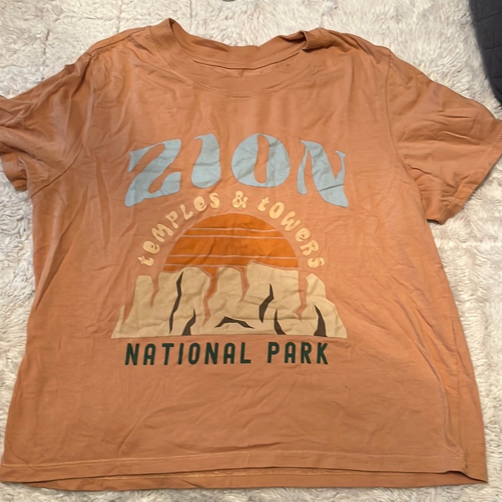 Orange tshirt with Zion on front